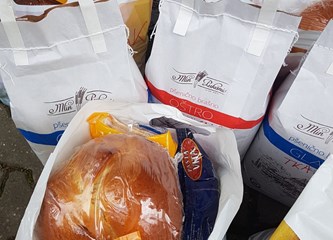 Rotary VG obogatio uskrsni stol za 37 štićenika Caritasa